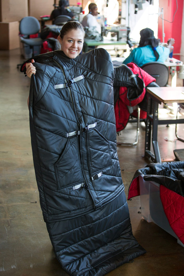 Veronika showing off an older version of the sleeping bag coat