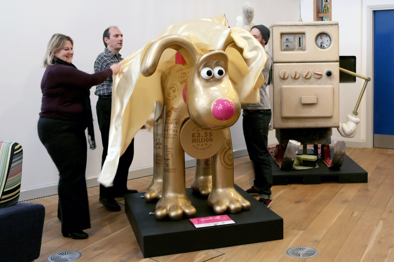 Gromit sculpture covered in graphical statistics