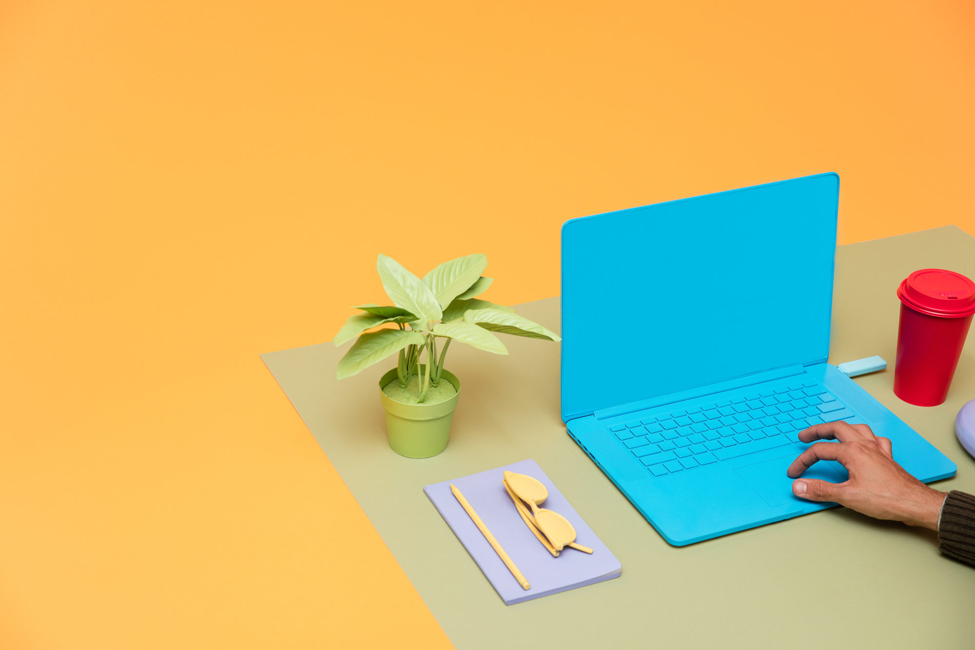colorful desk scene with computer painted blue