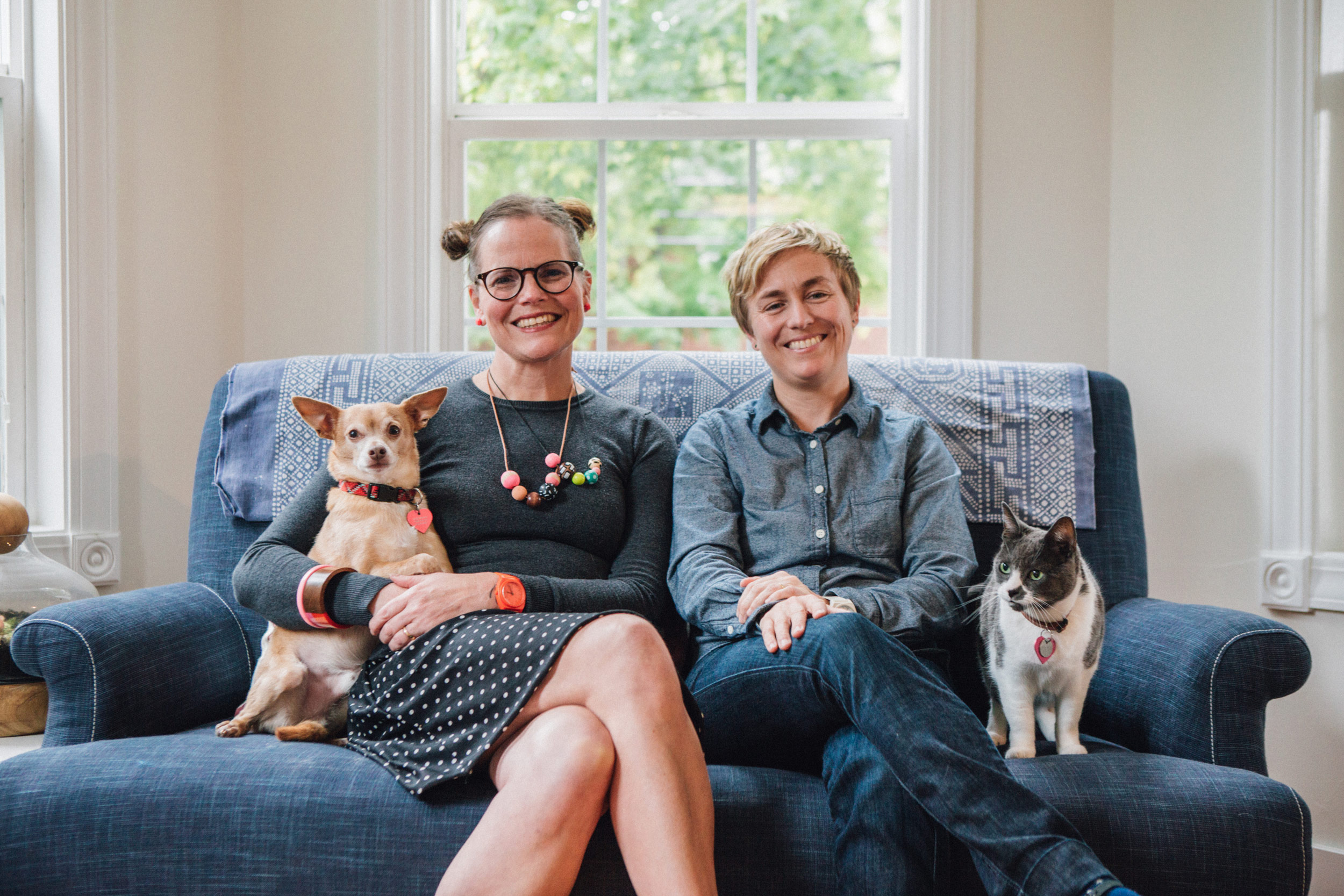 Lisa and Clay with their dog, Wilfredo, and cat, Margaret, at their home in Portland, OR
