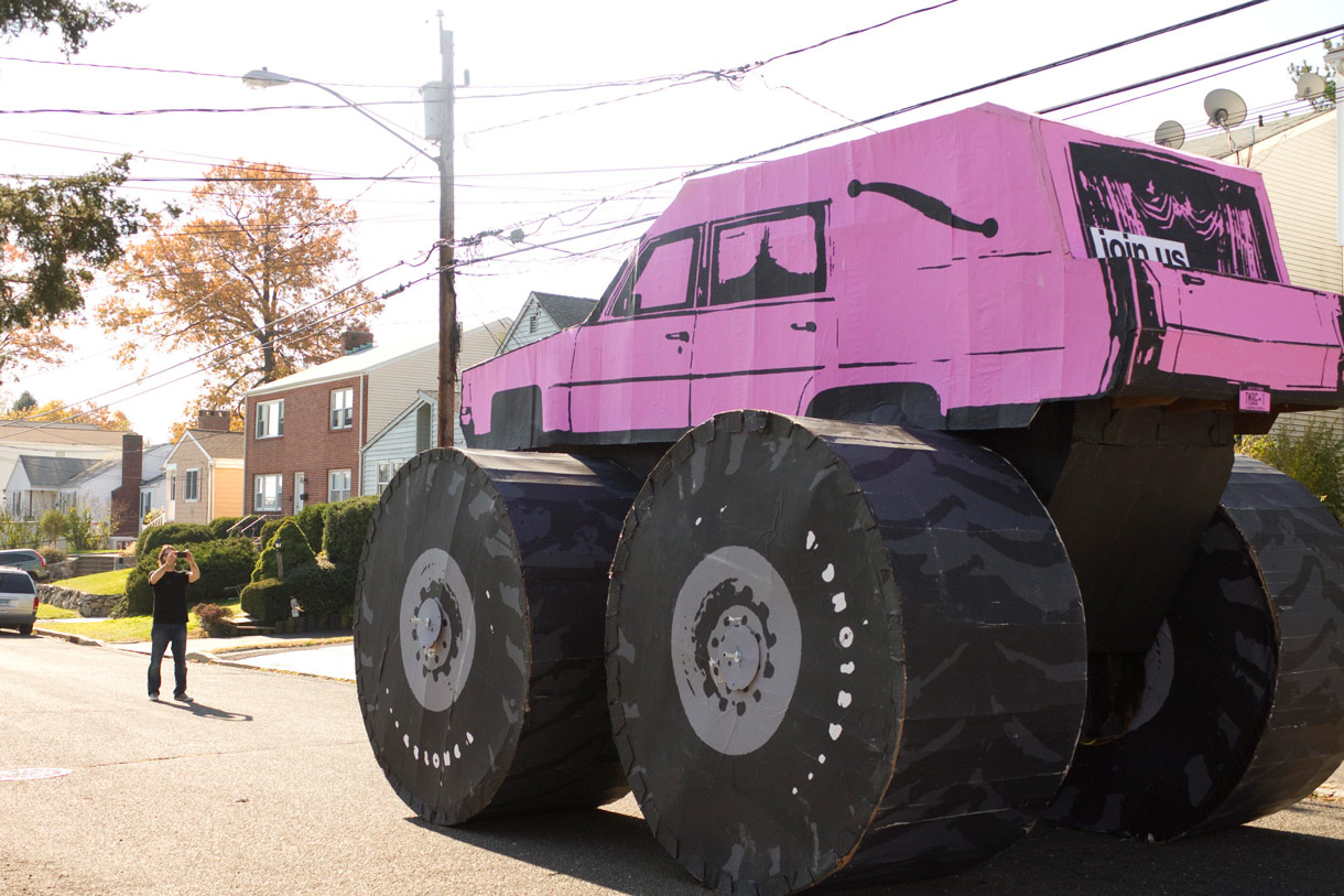A life-size paper monster truck hearse for They Might Be Giants