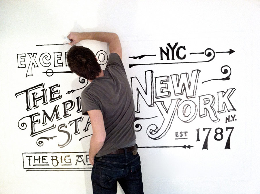 Dan working on his mural at the Ace Hotel